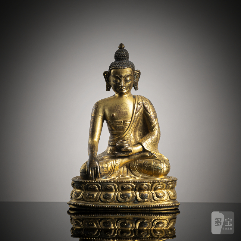 A GILT-BRONZE FIGURE OF BUDDHA SHAKYAMUNI